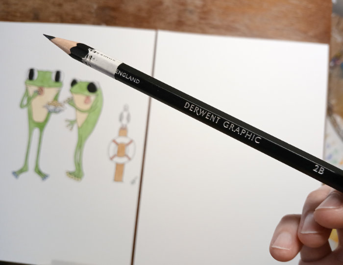 A photo of a Derwent Graphic 2B pencil - used to sketch Frog's Bucket List illustrations.