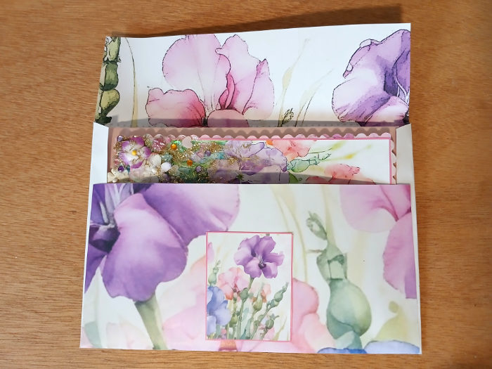 The finished article inside the colourful envelope - showing a perfect fit.