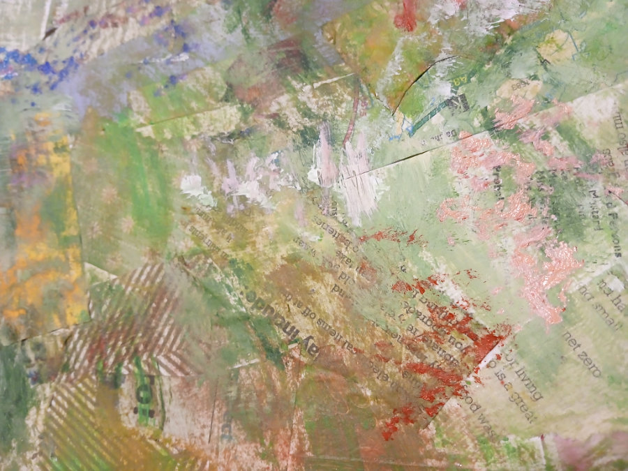 A close up of the green background which shows old newspaper scraps behind scumbling and stippling mixed media art techniques.