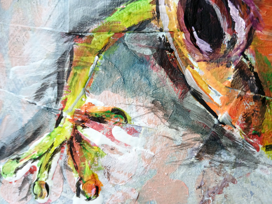 A close up of the 'blue' frog - a painting by Ruth Burton. The close-up shows the white acrylic medium against the black acrylic paint.