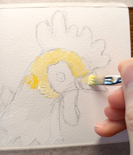 Adding yellow acrylic paint to the chicken sketch by Ruth Burton Artist.